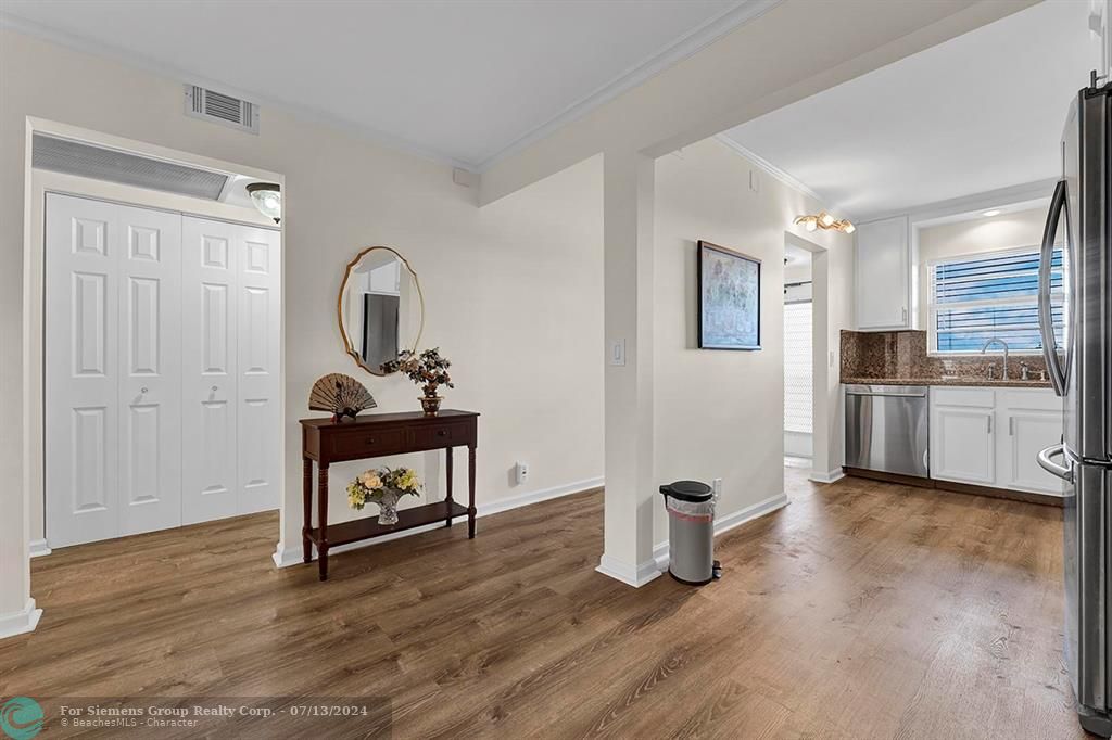 Kitchen with condo entrance view