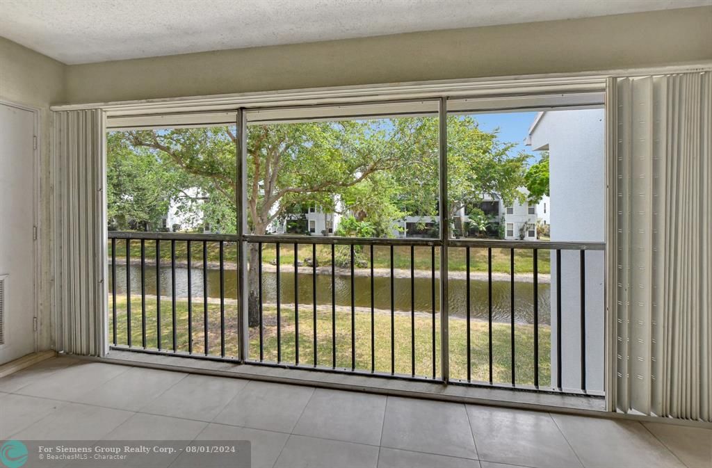 Spacious balcony with water view & extra storage closet!