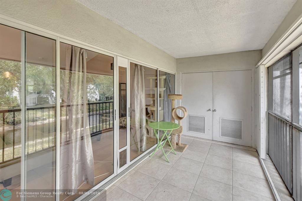 Spacious balcony with water view & extra storage closet!