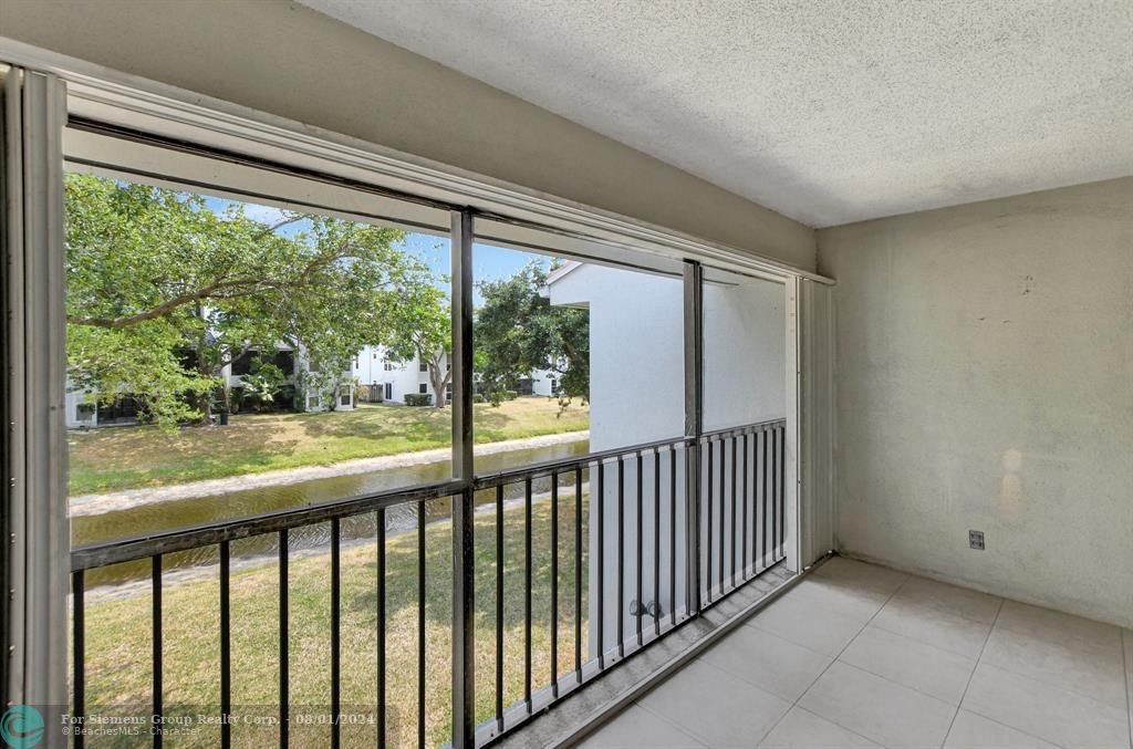 Spacious balcony with water view & extra storage closet!