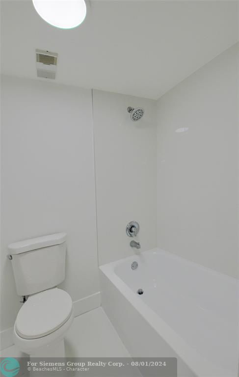 Private Toilet & Bathtub Area with Linen Closet in Master Bathroom!